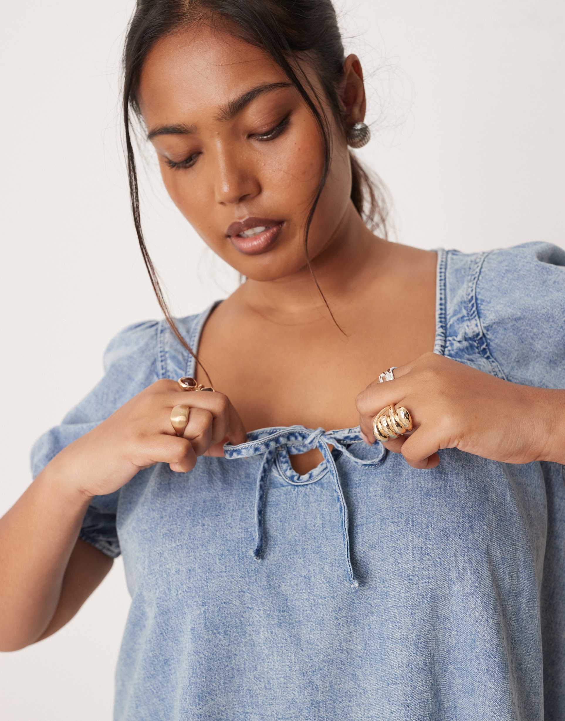 ASOS DESIGN Curve denim mini dress with puff sleeve and tie detail in light wash