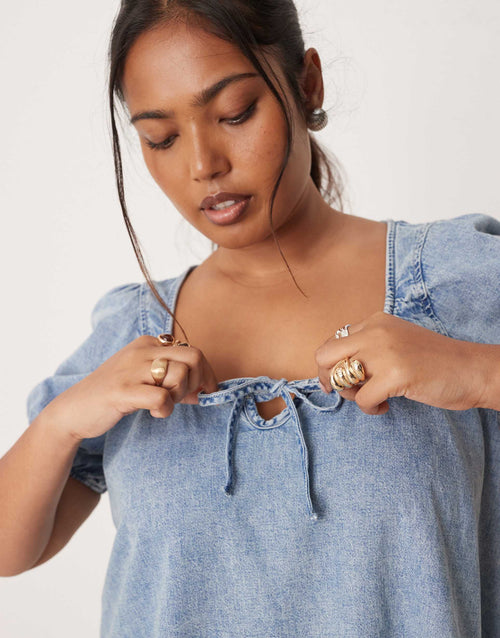 ASOS DESIGN Curve denim mini dress with puff sleeve and tie detail in light wash
