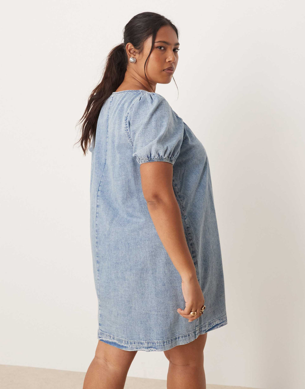 ASOS DESIGN Curve denim mini dress with puff sleeve and tie detail in light wash