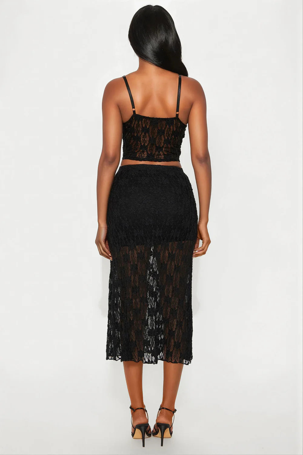 Black lace two-piece outfit on a white background
