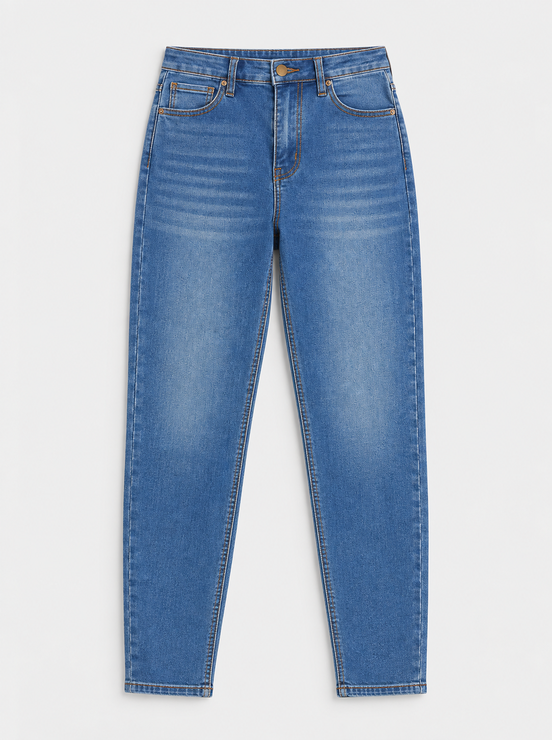 Flat lay of Curvy Fit Stretch Skinny Jeans - Medium Wash on a light grey background