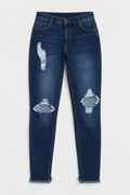 Flat lay of Fray Hem Distressed Skinny Jeans - Dark Wash on a light grey background