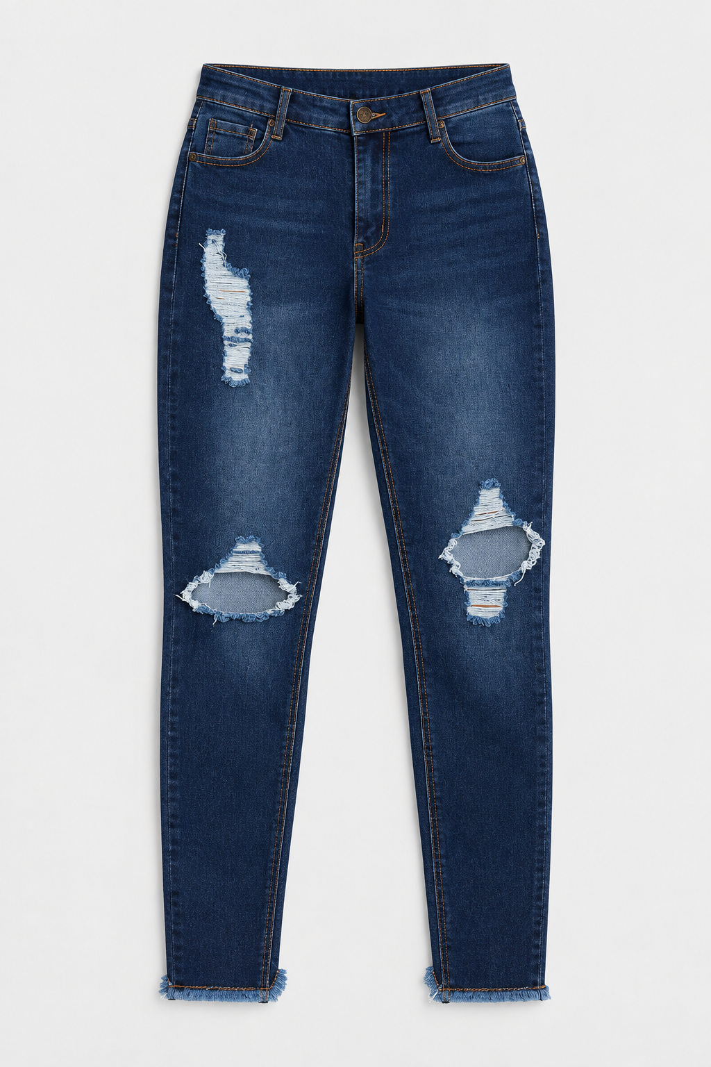 Flat lay of Fray Hem Distressed Skinny Jeans - Dark Wash on a light grey background