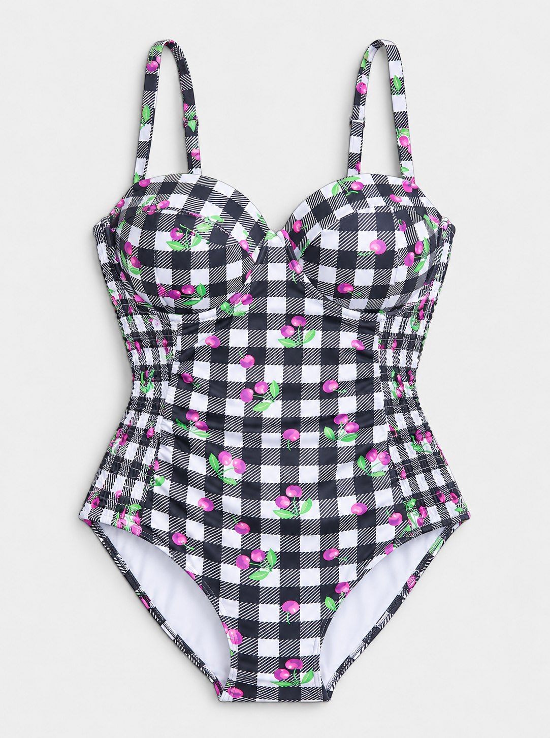 Flat lay of Smocked Underwire Cherry Print Swimsuit - White Combo on a light grey background