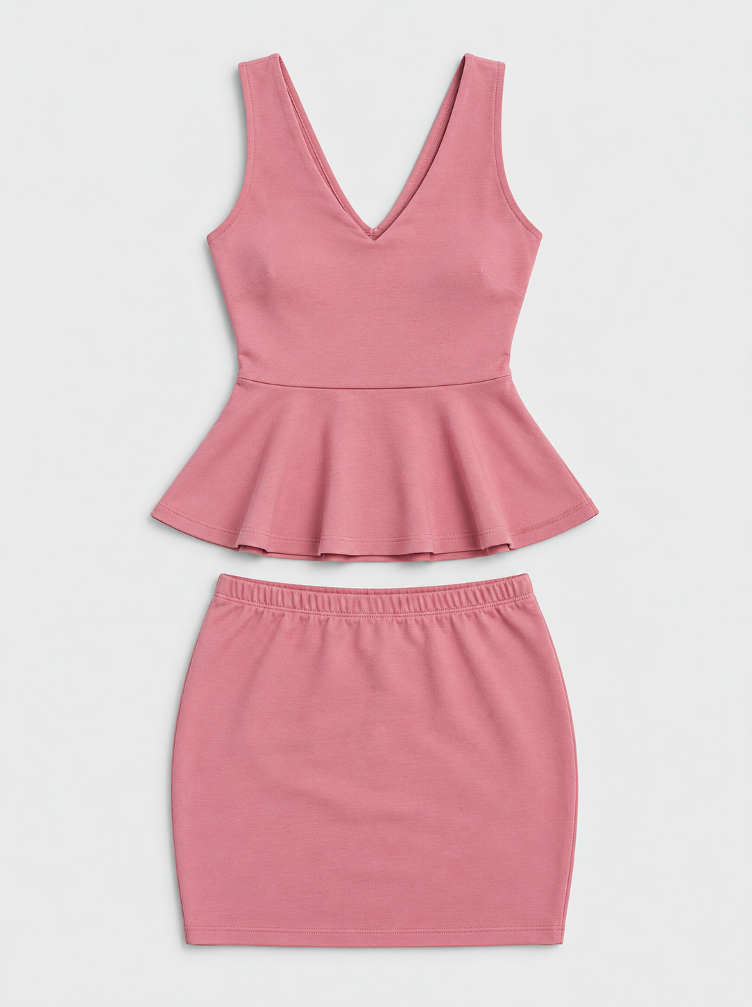 Flat lay of Stretch Ponte Top and Skirt Set - Pink on a light grey background